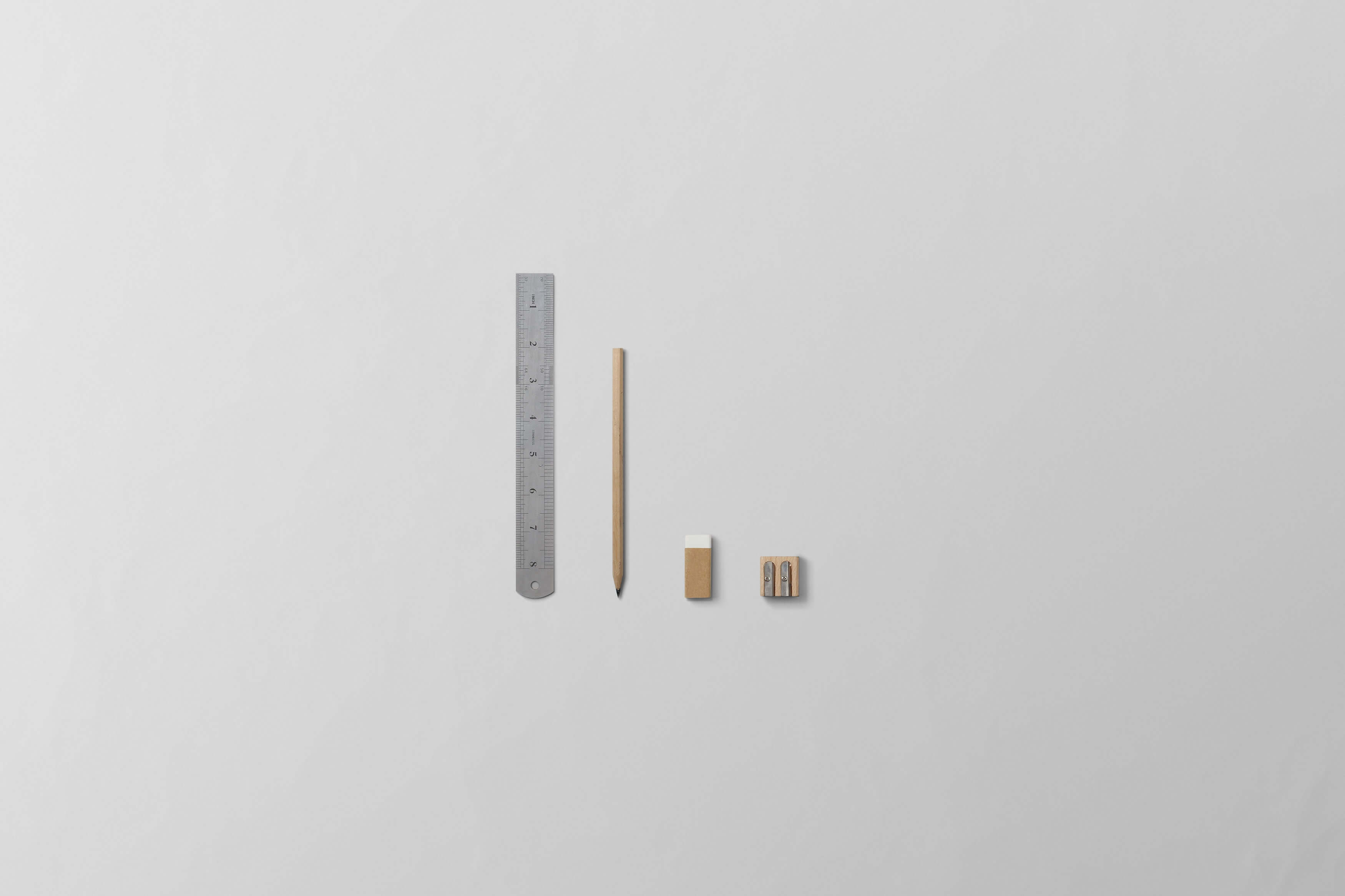 image of ruler, pencil, eraser and sharpener